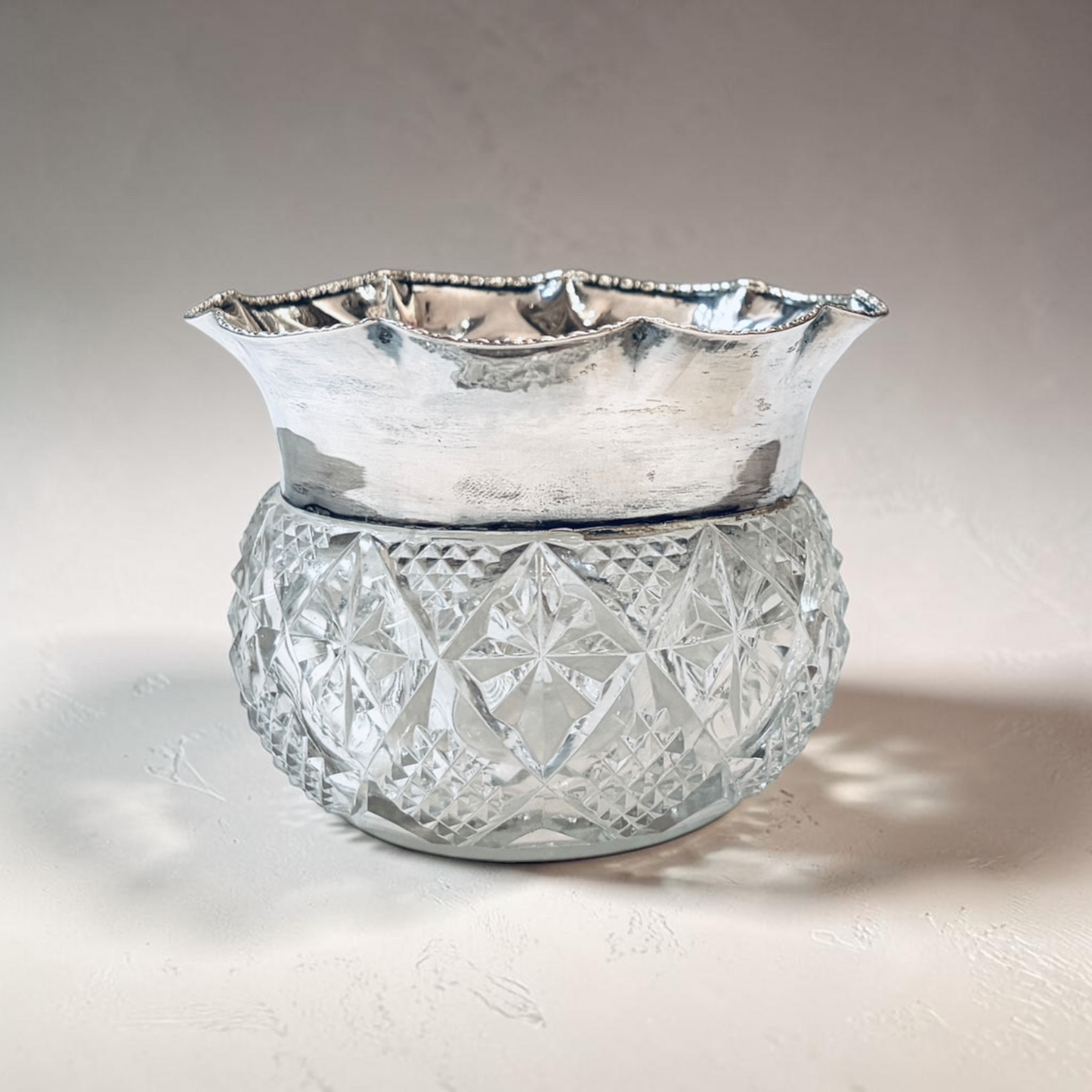 AN EDWARDIAN DIAMOND-CUT SILVER-MOUNTED BOWL, CHESTER, 1907