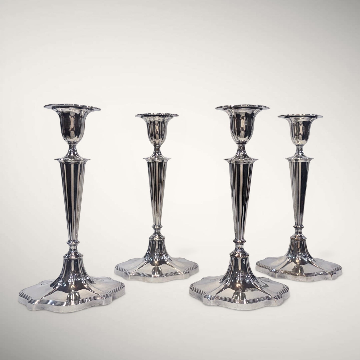 SET OF FOUR FLUTED STERLING SILVER CANDLESTICKS, SHEFFIELD, 1926