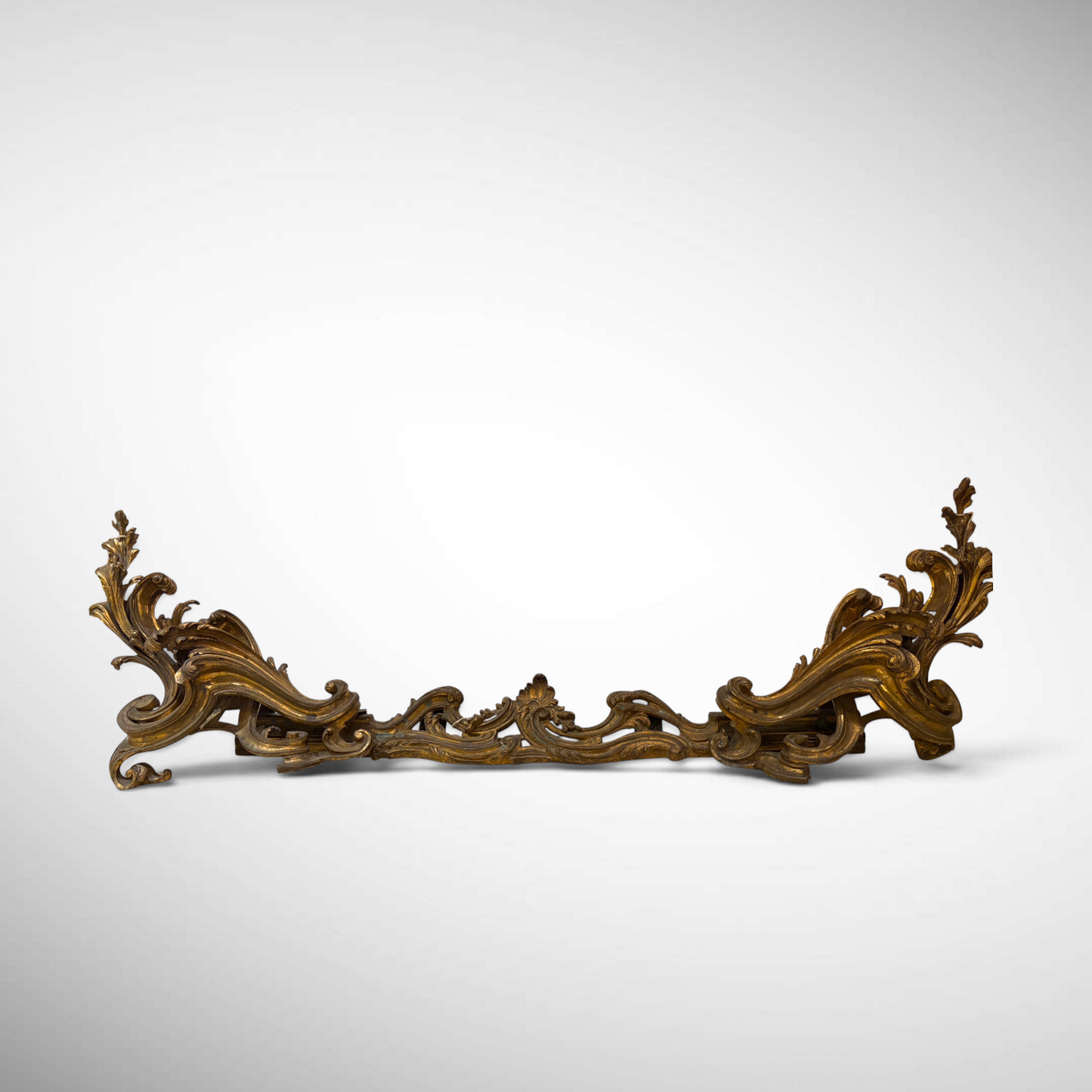 LOUIS XV STYLE CAST AND GILDED BRONZE FIREPLACE FENDER, FRANCE, C. 1850