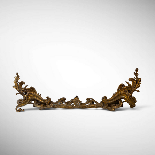 LOUIS XV STYLE CAST AND GILDED BRONZE FIREPLACE FENDER, FRANCE, C. 1850