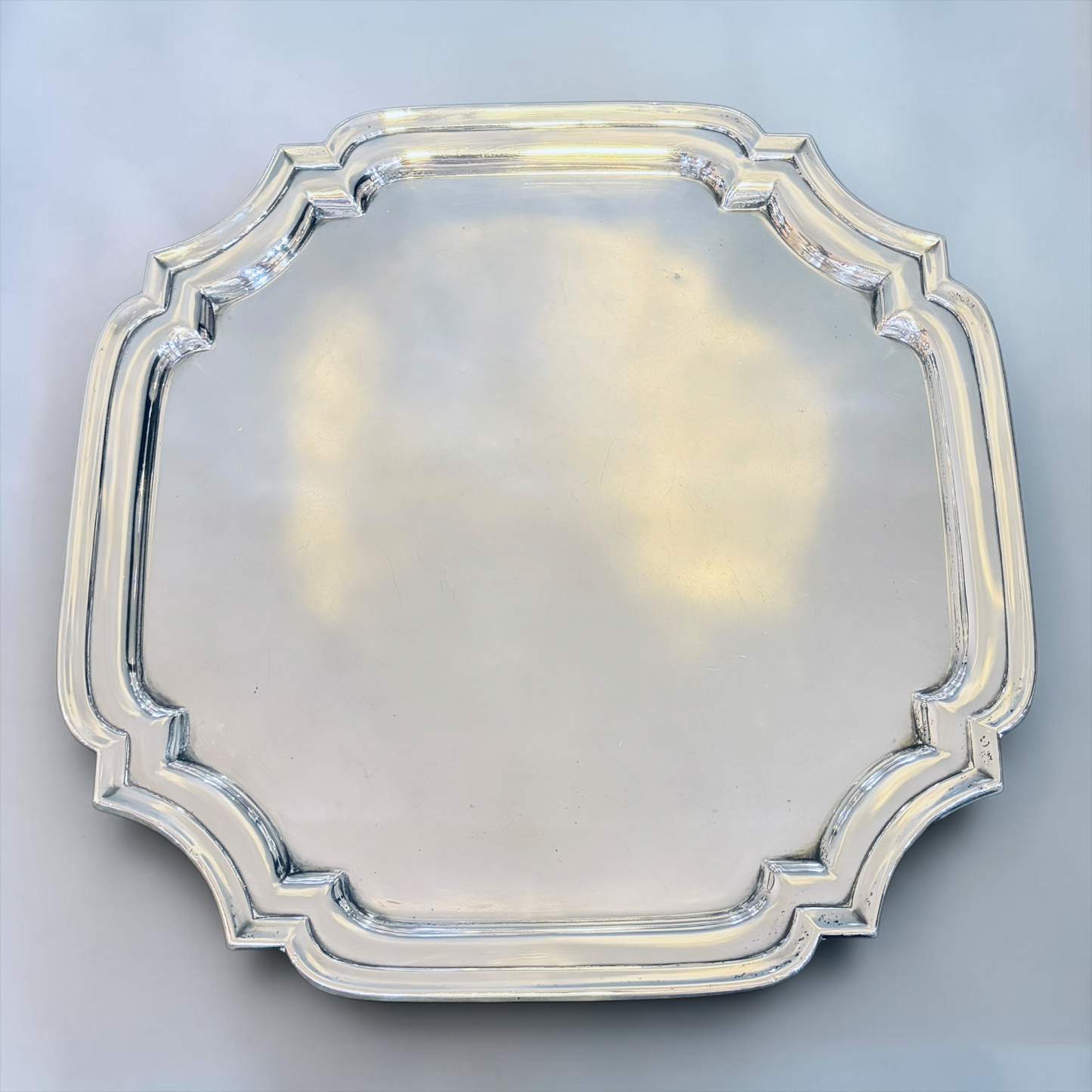 A SQUARE CHIPPENDALE STERLING SILVER SALVER, BIRMINGHAM, 1937