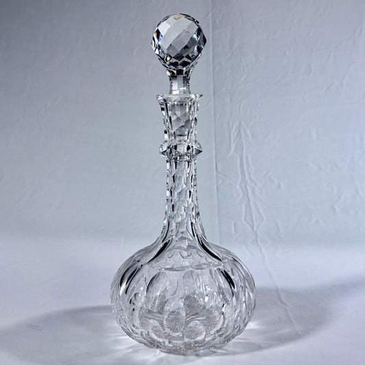 KLS Vaults mid-century Bohemian lead crystal spirit decanter with deep-cut thumbprint patterns and faceted stopper.