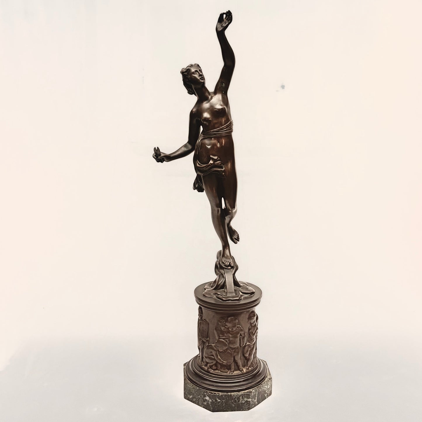 KLS Vaults neoclassical patinated bronze Atropos figure with shears on a relief-cast pedestal and marble plinth.