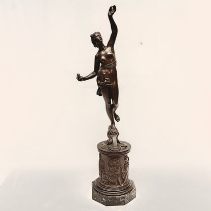KLS Vaults neoclassical patinated bronze Atropos figure with shears on a relief-cast pedestal and marble plinth.