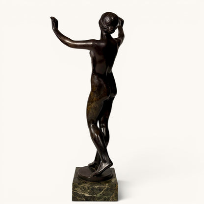 KLS Vaults patinated bronze figure of a nude female dancer, Art Nouveau style, on marble base.