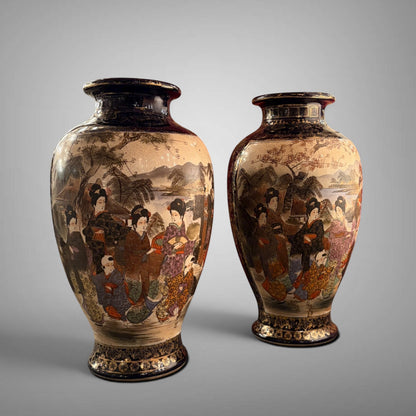 KLS Vaults pair of Meiji period cobalt Satsuma vases featuring hand-painted bijin figures and landscape scenes.