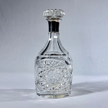 KLS Vaults 1936 George VI cut crystal decanter with sterling silver collar and intricate geometric diamond patterns.