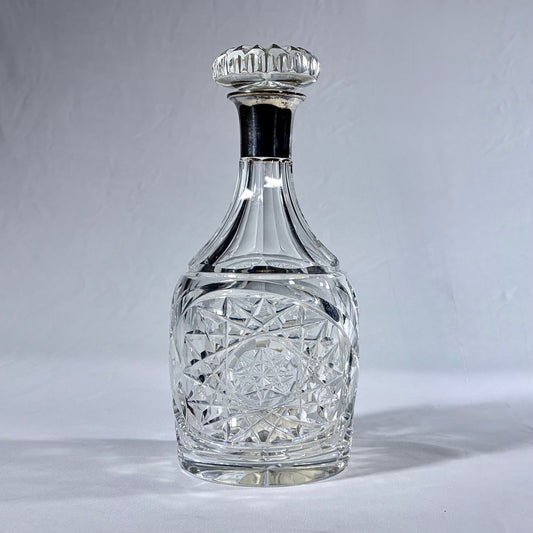 KLS Vaults 1936 George VI cut crystal decanter with sterling silver collar and intricate geometric diamond patterns.