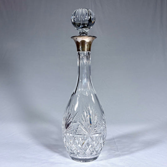 KLS Vaults large cut crystal decanter with sterling silver neck and fluted ball stopper, Birmingham 1990.