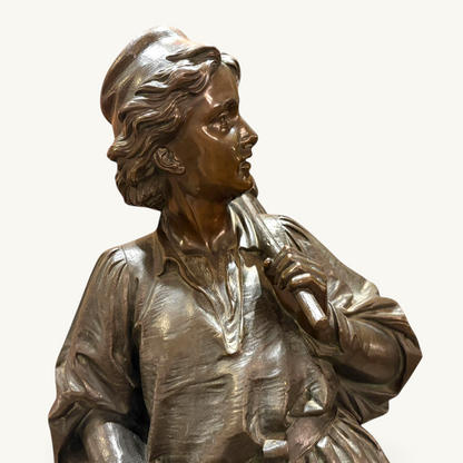 KLS Vaults 1873 patinated bronze sculpture of Dick Whittington by Charles Bell Birch, showing detailed tunic texture.