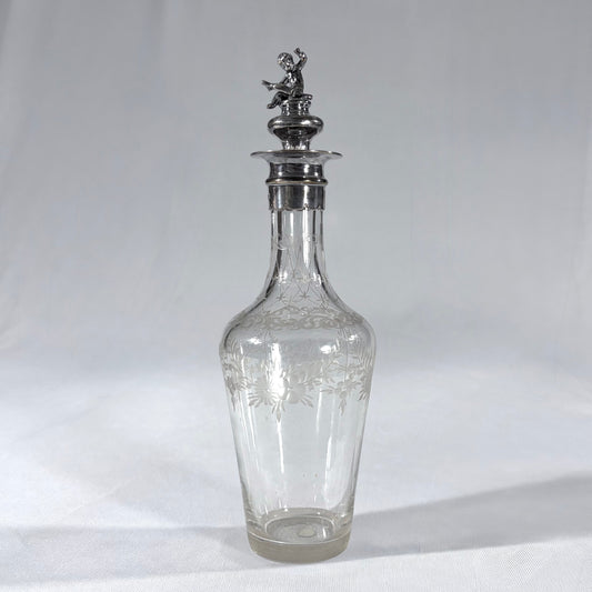 KLS Vaults Edwardian glass liqueur decanter with frosted floral etching and a sterling silver cherub stopper from 1902.