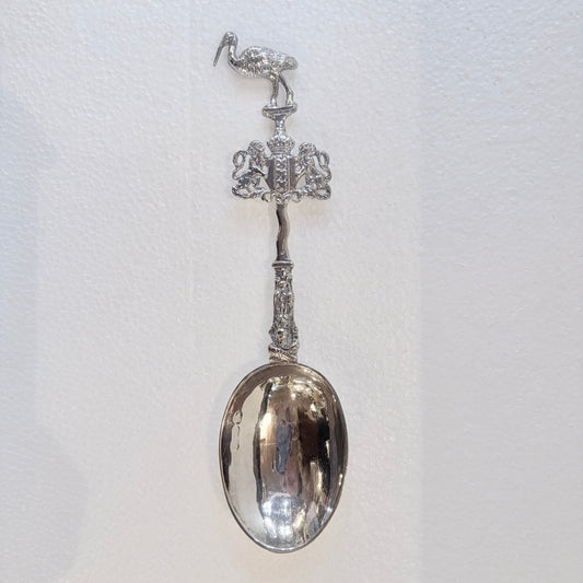 KLS Vaults 1902 Edwardian sterling silver marriage spoon with stork finial and ornate figural stem.
