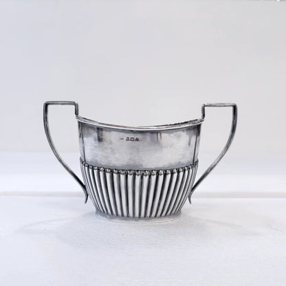 KLS Vaults Edwardian sterling silver sugar bowl with vertical gadrooned body and bead-and-reel border detail.