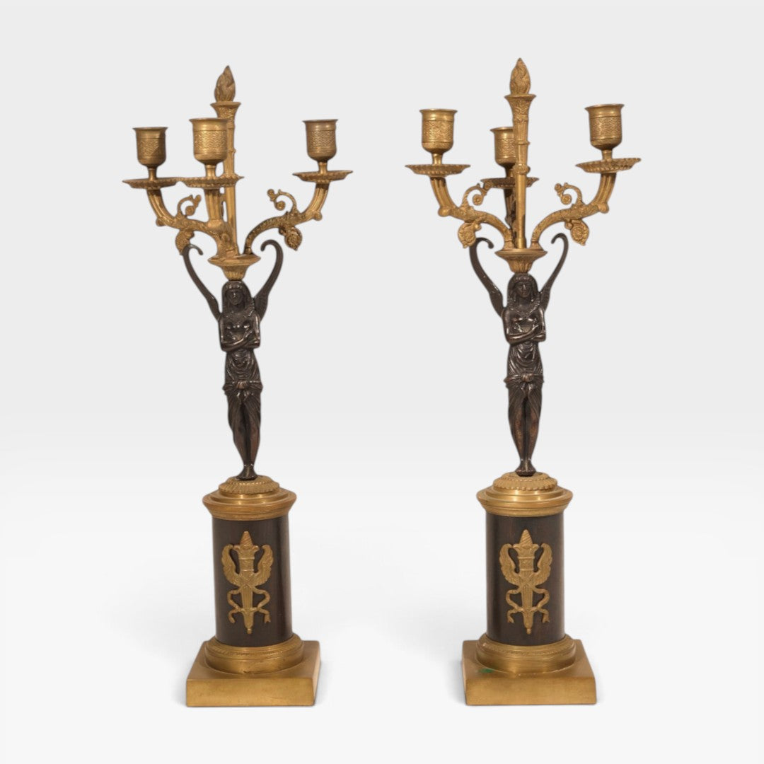 KLS Vaults pair of Egyptian Revival patinated and gilt bronze three-light candelabra with female figural stems
