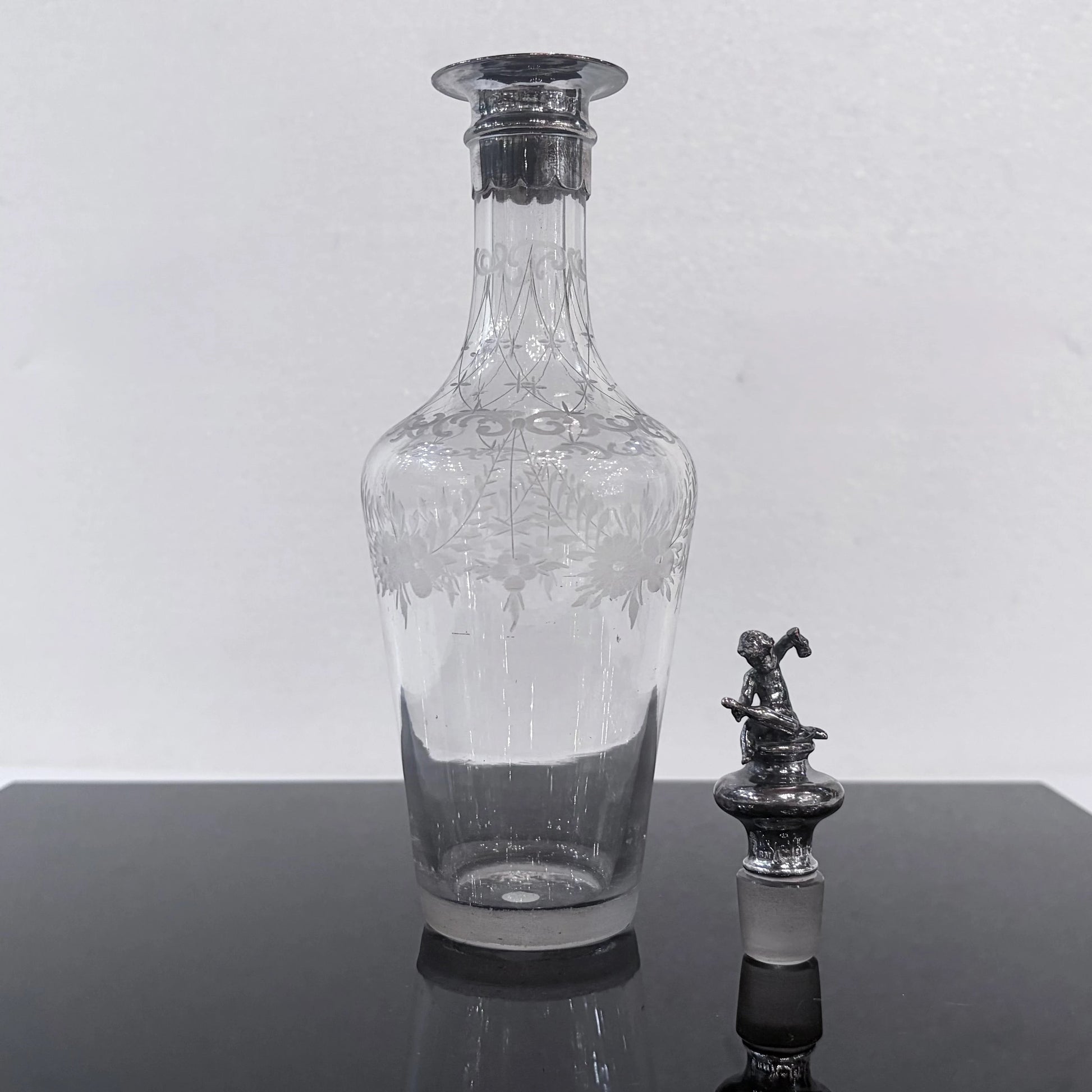 KLS Vaults 1902 Edwardian glass decanter with frosted floral etching and a sterling silver cherub stopper.
