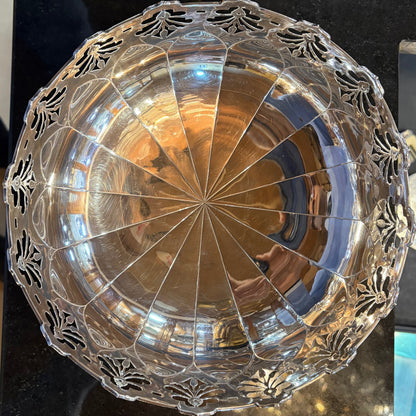 KLS Vaults George VI sterling silver centerpiece bowl with intricate pierced foliate rim and fluted design, 1949.