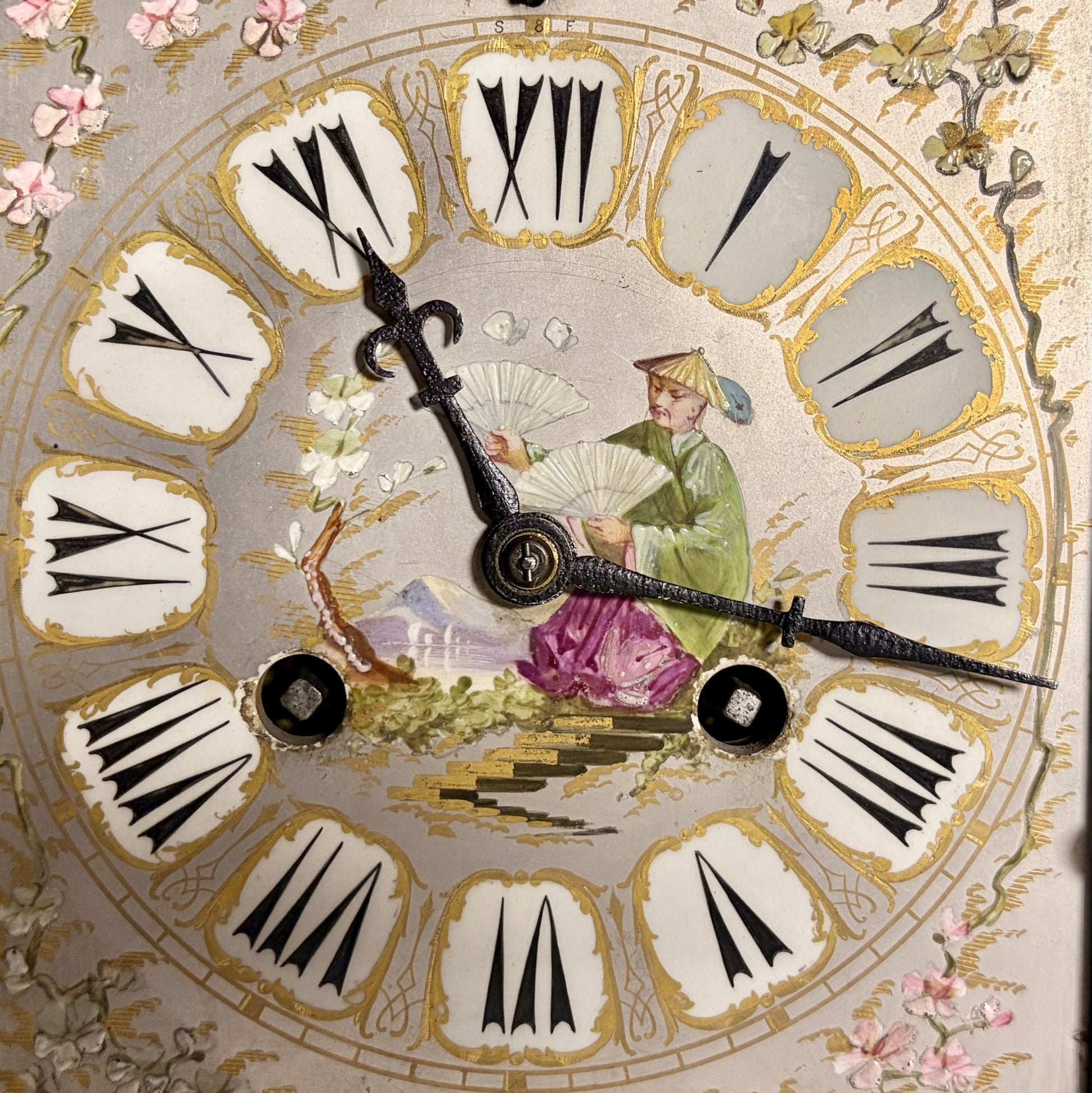 KLS Vaults French gilt-bronze mantel clock dial with hand-painted Chinoiserie porcelain figure and Roman numerals