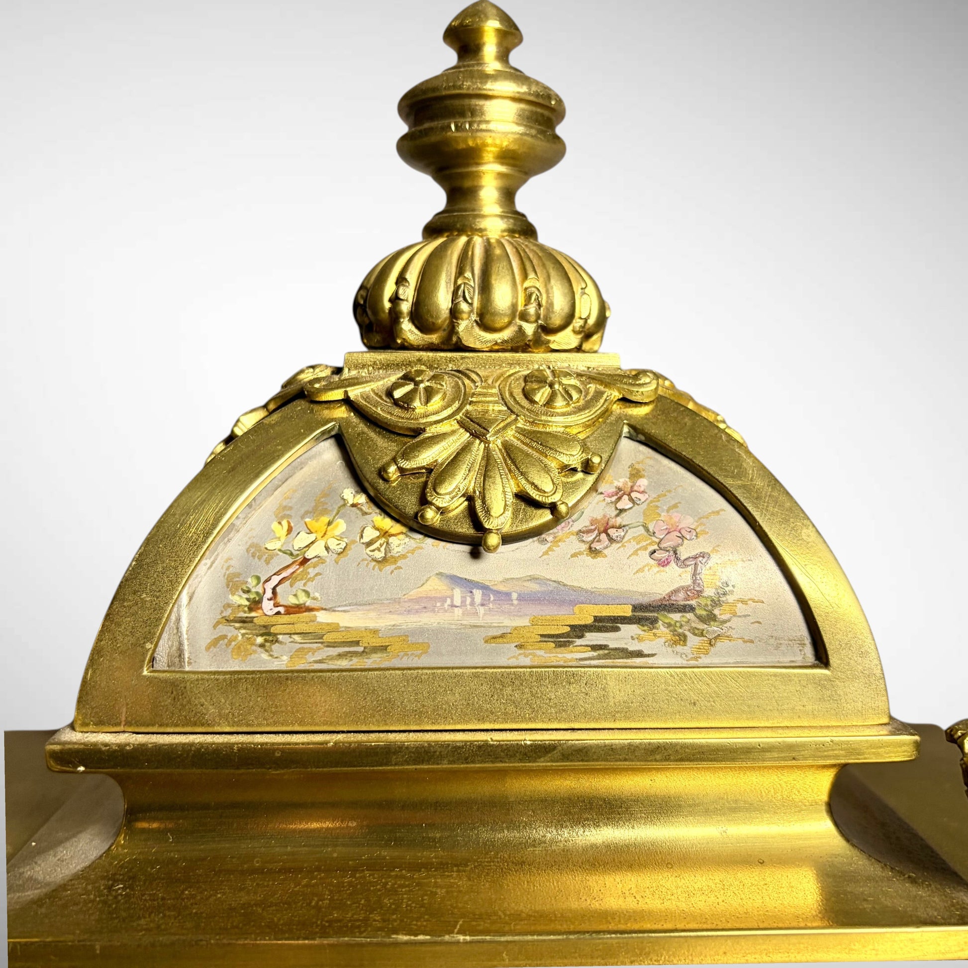 KLS Vaults French gilt-bronze mantel clock pediment with hand-painted Chinoiserie porcelain panel and ornate finial