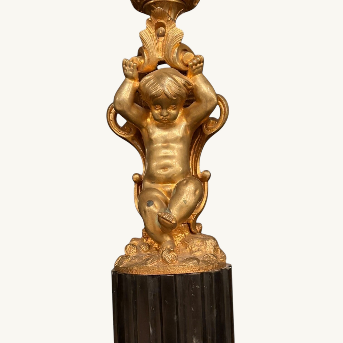 KLS Vaults gilt bronze putto figure detail from a 19th-century French Rococo revival candelabrum on marble base