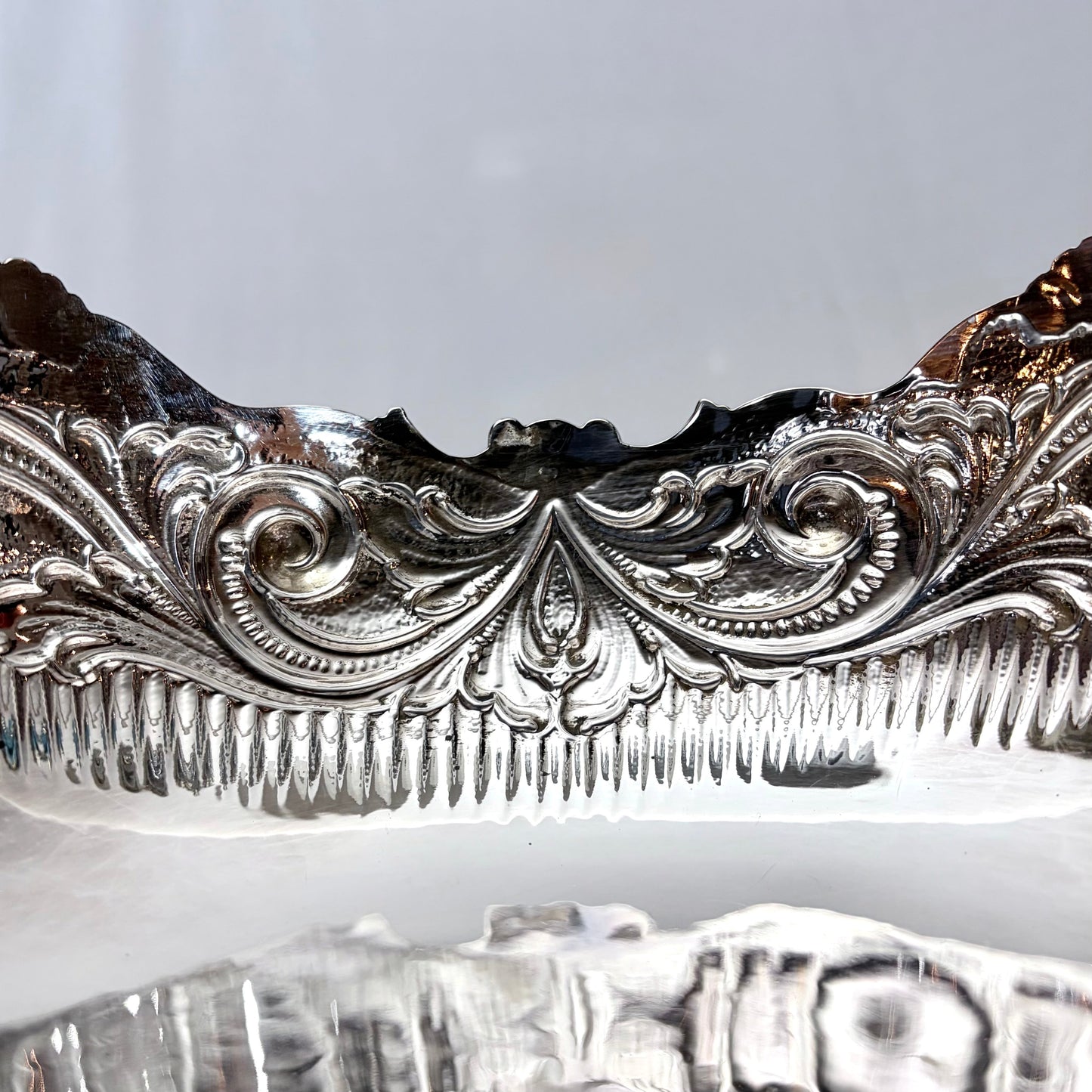 KLS Vaults Italian .800 silver centerpiece featuring intricate repoussé foliate scrolls and shell motifs in Rococo style.