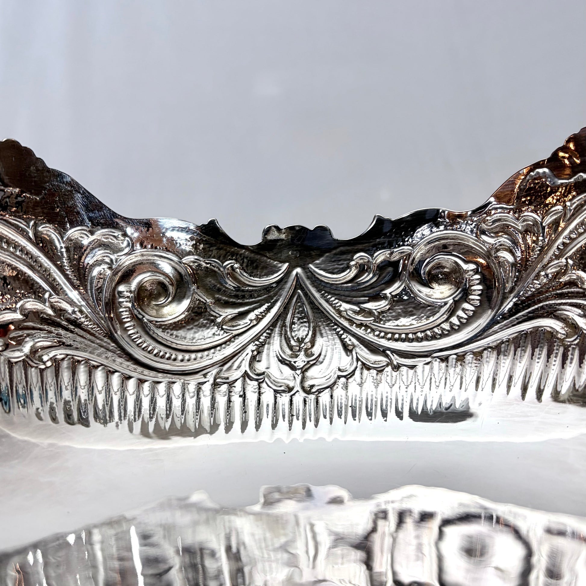 KLS Vaults Italian .800 silver centerpiece featuring intricate repoussé foliate scrolls and shell motifs in Rococo style.