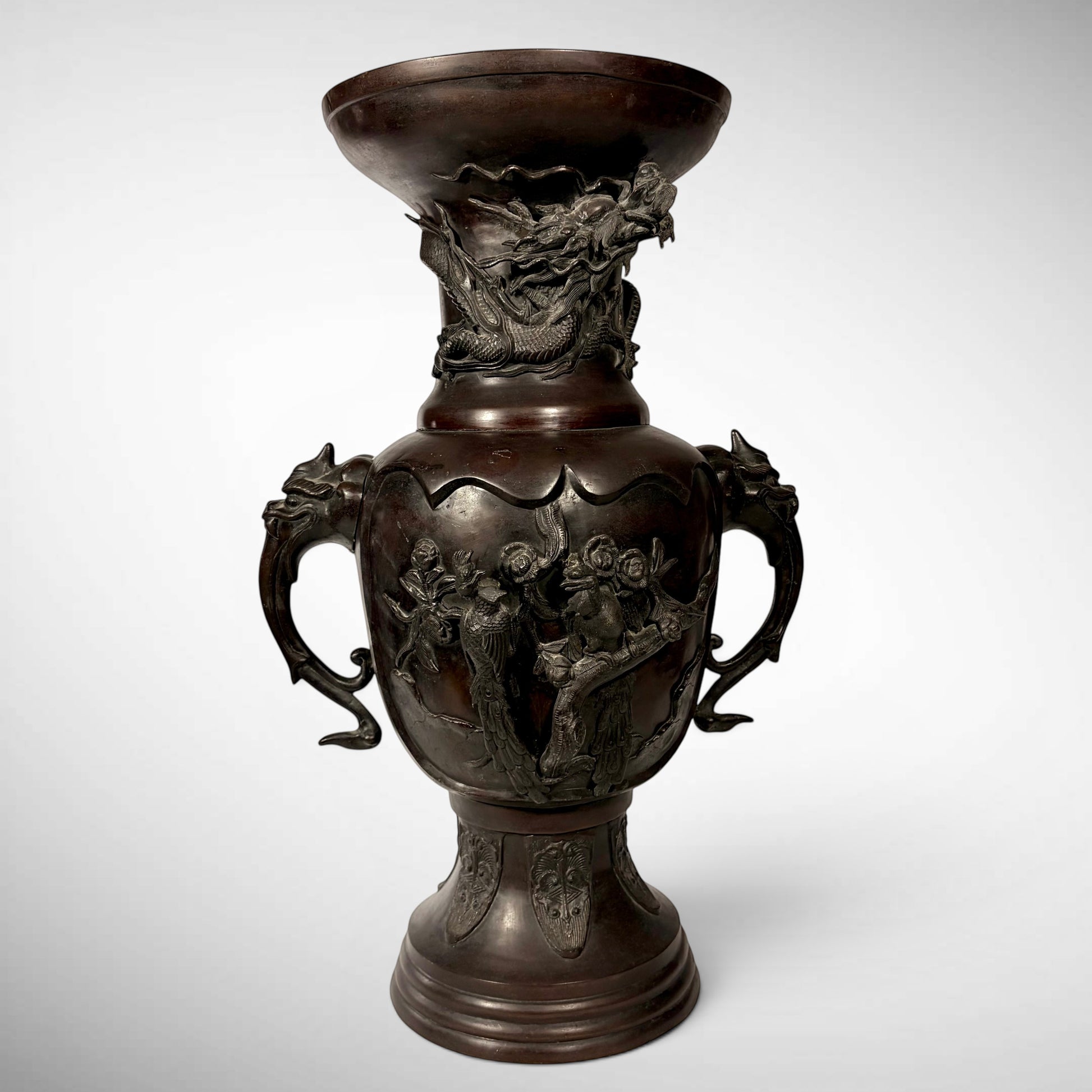 KLS Vaults antique Japanese bronze vase with high-relief dragon, phoenix, and shishi head handles in reddish-brown.
