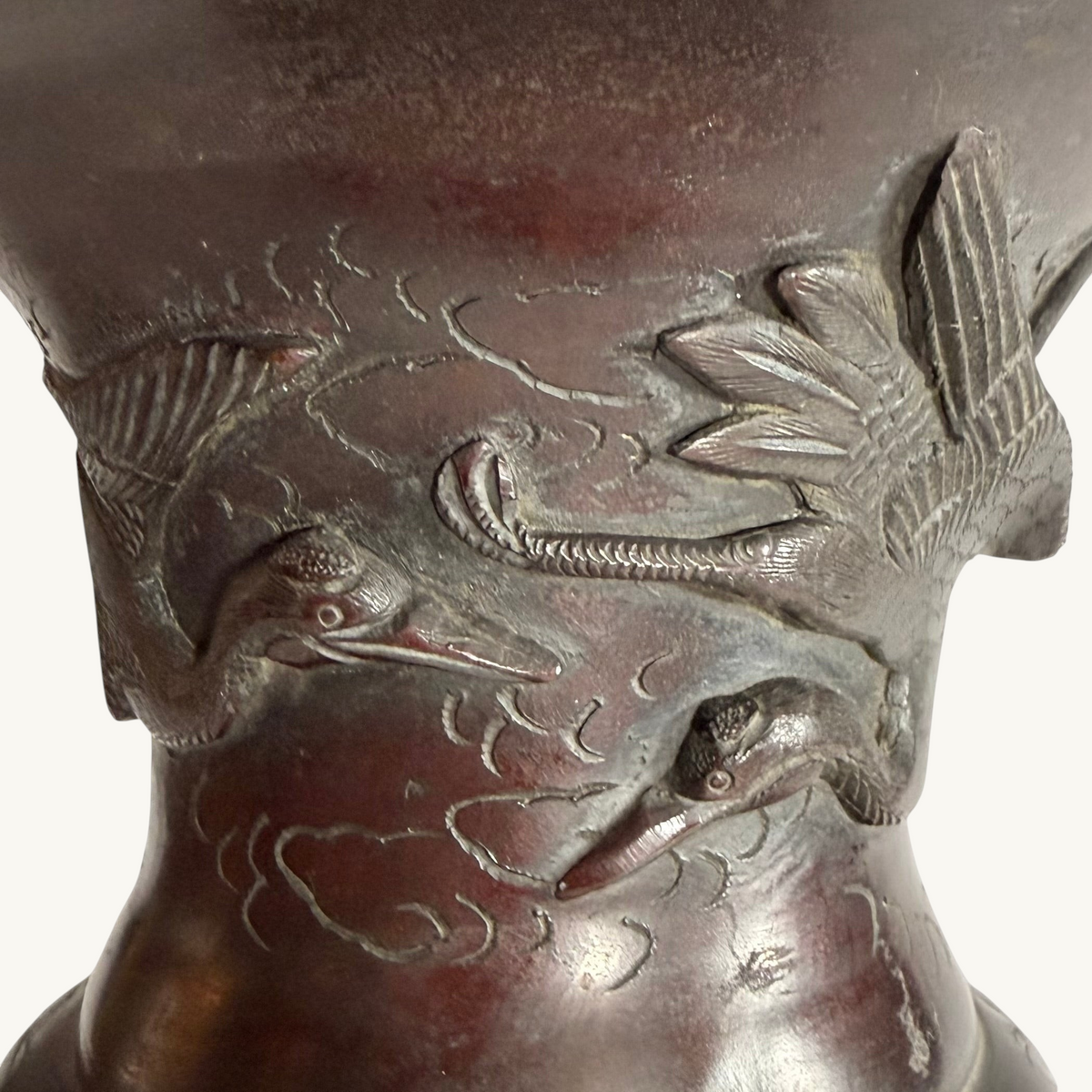 KLS Vaults Japanese Meiji bronze vase neck detail featuring relief-carved cranes in flight among clouds