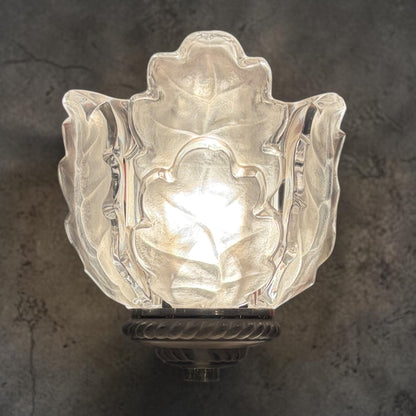 KLS Vaults Lalique Chene crystal wall sconce with frosted and polished oak leaf design on a chrome rope-twist mount.