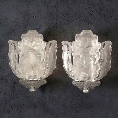 KLS Vaults pair of Lalique Chene oak leaf wall sconces in clear and frosted crystal with chrome rope-twist mounts.