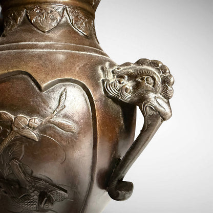 KLS Vaults Meiji period bronze vase featuring high relief kingfisher and lotus design with rooster-head handles
