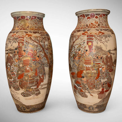 KLS Vaults pair of large Meiji period Satsuma earthenware vases with samurai and courtier scenes in raised enamel.