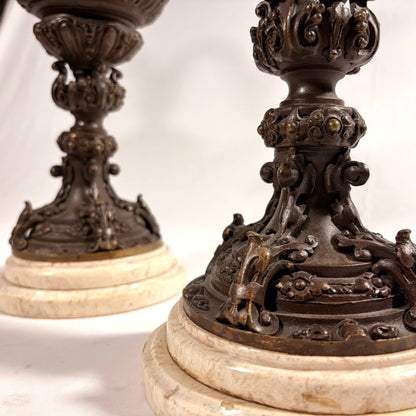 KLS Vaults pair of 19th-century Rococo Revival patinated bronze ewers with intricate floral motifs on marble bases