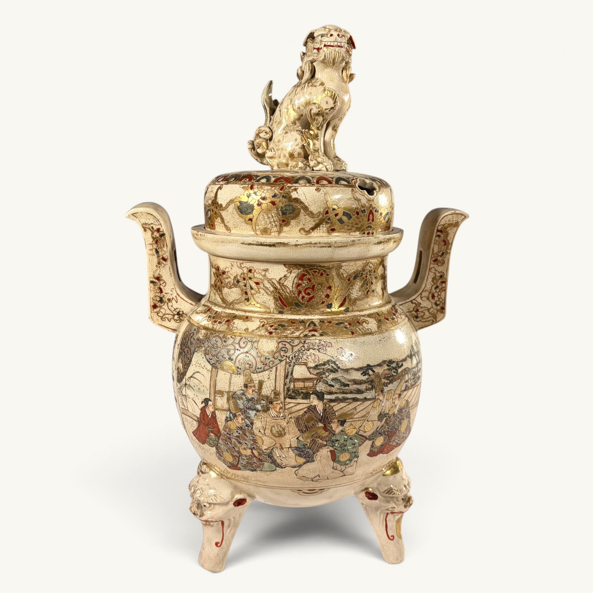 KLS Vaults Meiji period Satsuma incense burner with shishi finial, gold brocade painting, and tripod lion-dog feet.