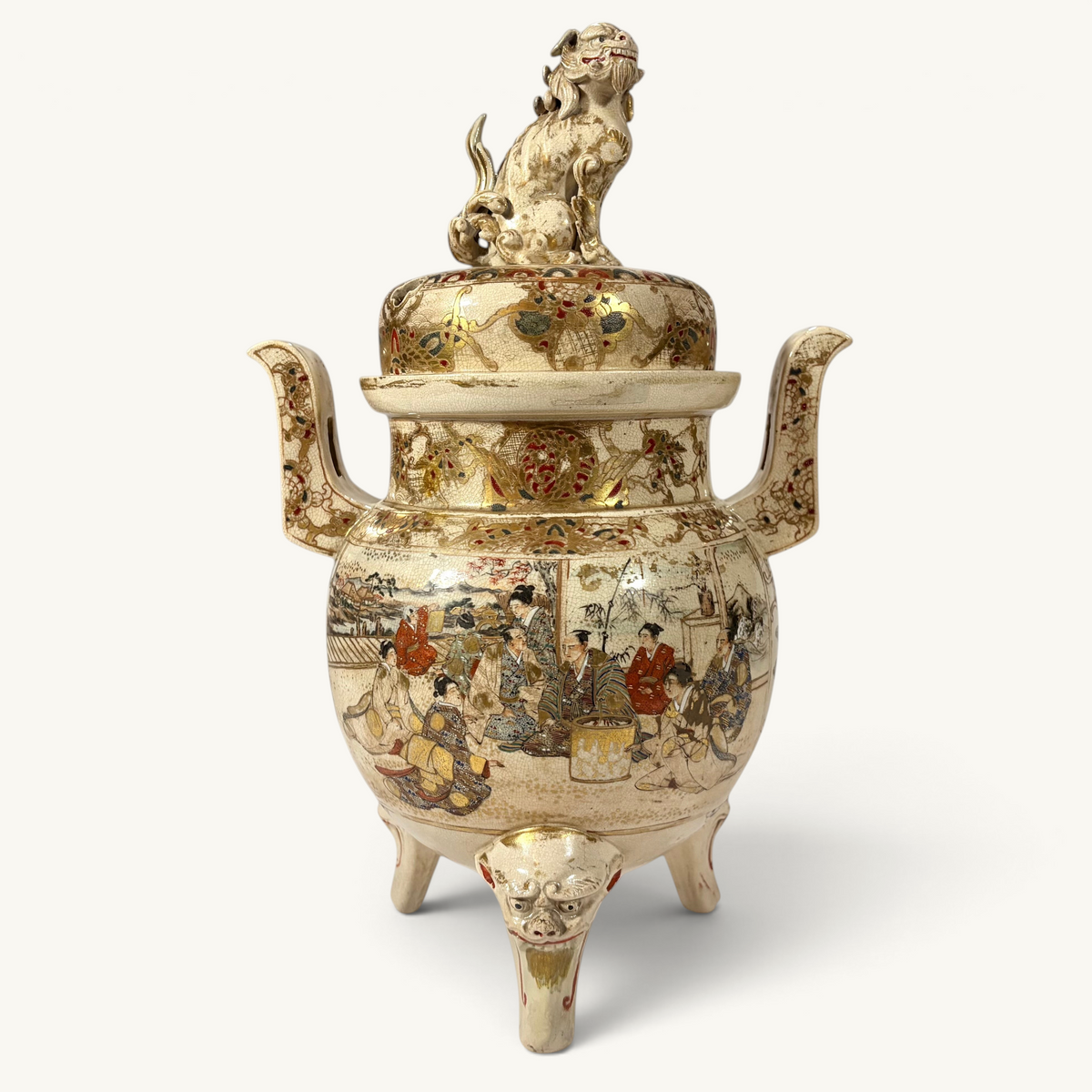 KLS Vaults Meiji period Satsuma incense burner with shishi finial, intricate gold brocade painting, and tripod feet.