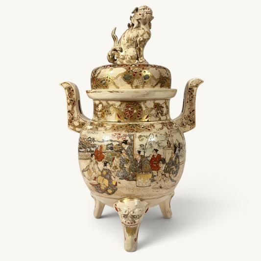 KLS Vaults Meiji period Satsuma incense burner with shishi finial, intricate gold brocade painting, and tripod feet.