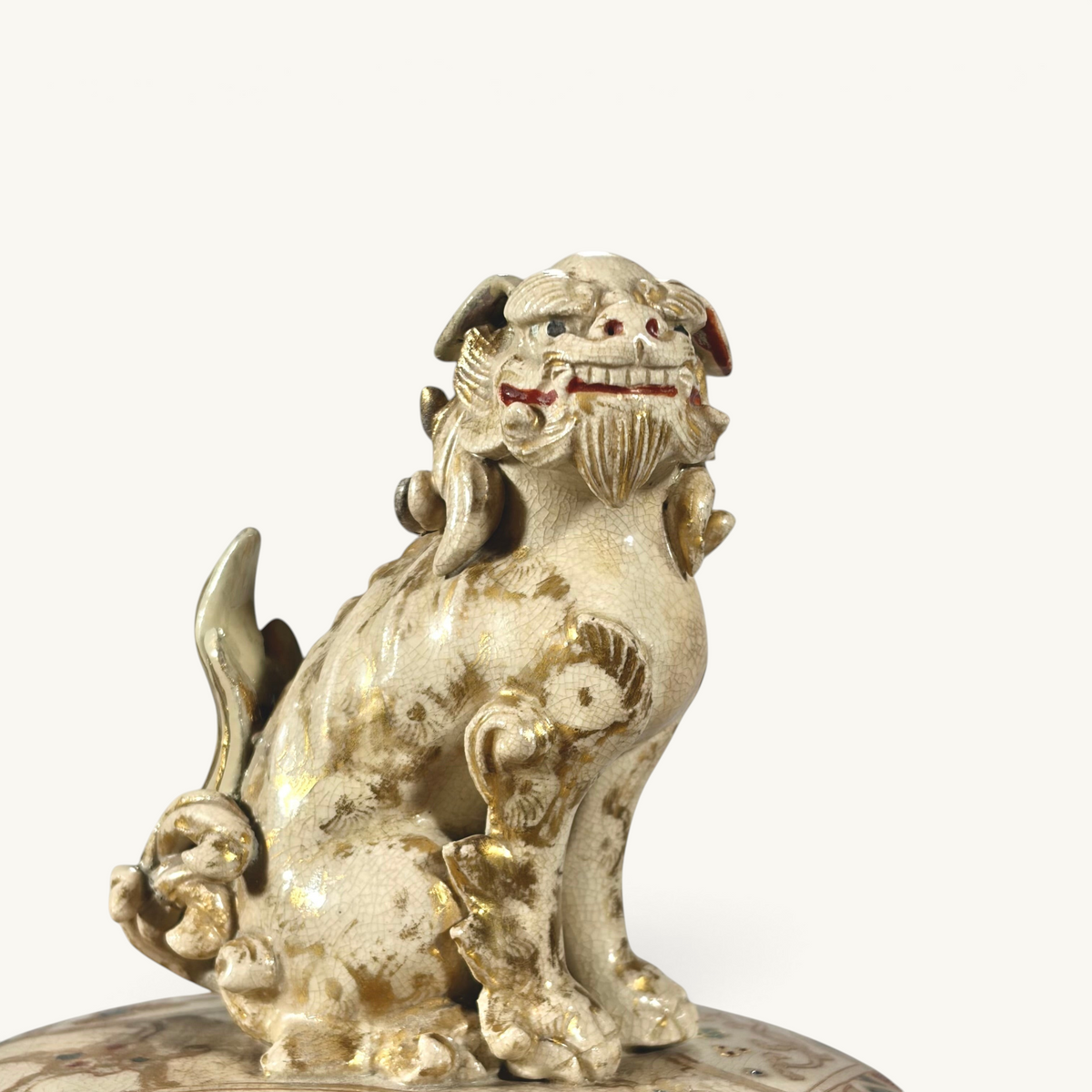 KLS Vaults Meiji period Satsuma earthenware shishi lion-dog finial with ivory crackle glaze and gold enamel detailing.