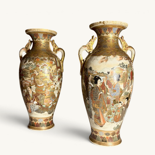 KLS Vaults pair of antique Japanese Satsuma vases with gilt dragon handles, depicting court ladies and samurai warriors in detailed kimono and armor.