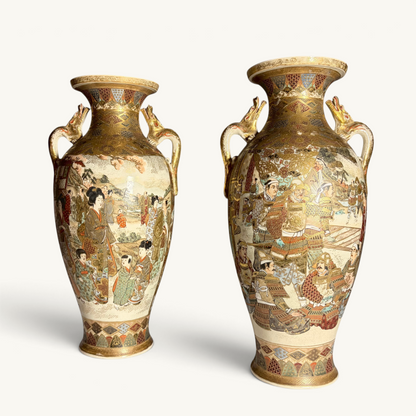 KLS Vaults pair of antique Japanese Satsuma vases with gilt dragon handles, depicting court ladies and samurai warriors in intricate detail.