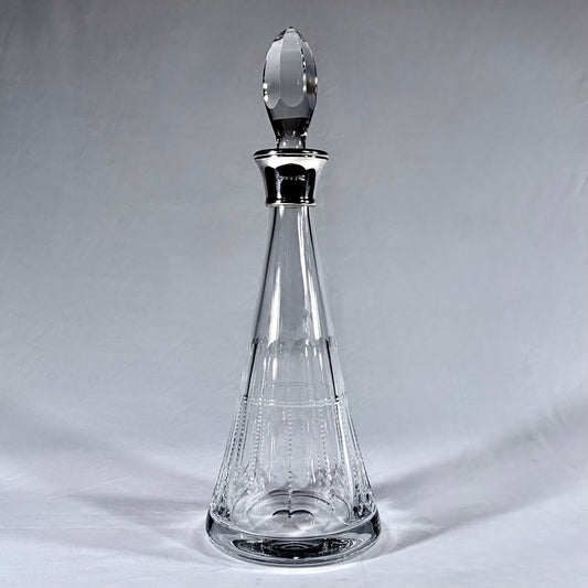 KLS Vaults Elizabeth II lead crystal conical decanter with sterling silver collar and faceted crystal stopper.