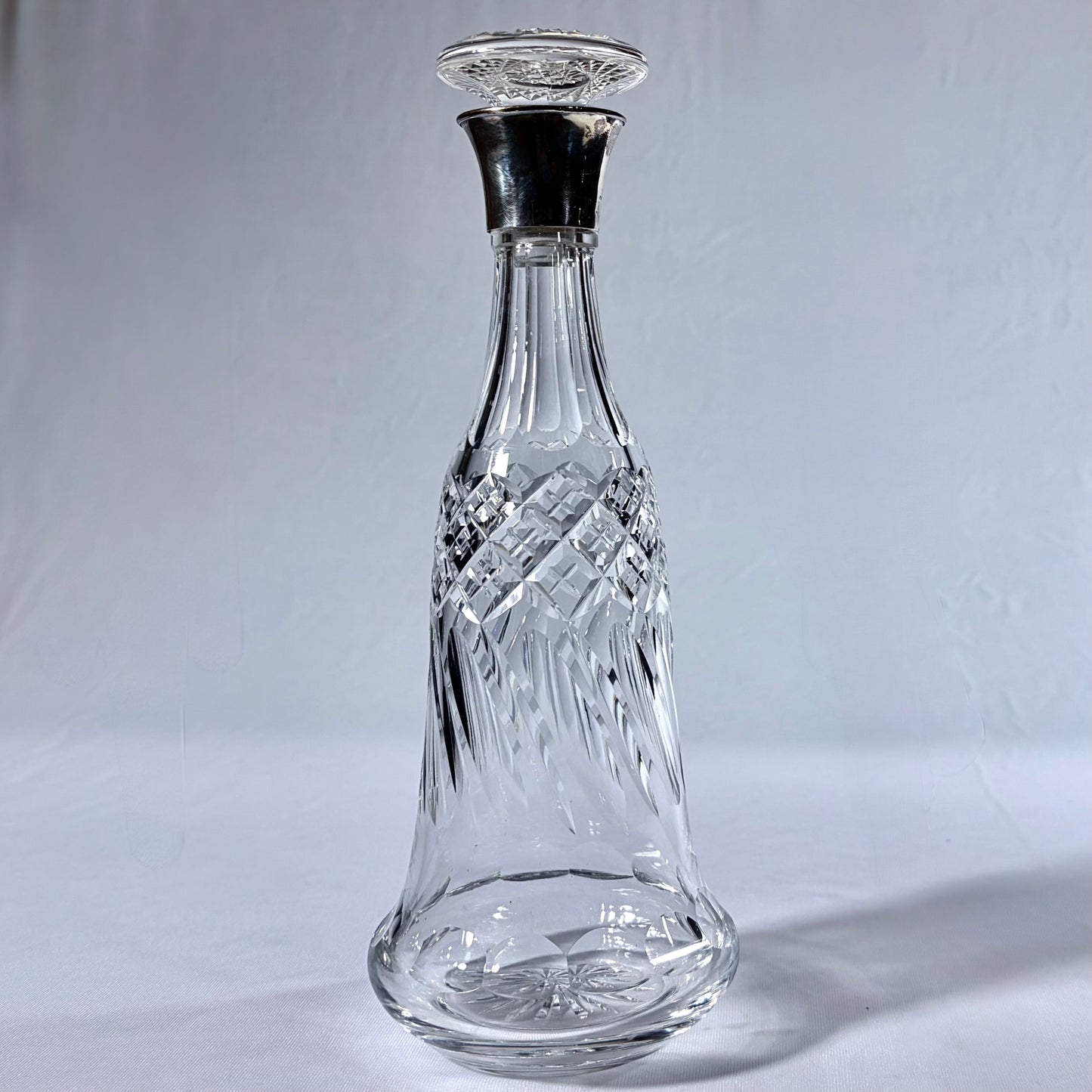 KLS Vaults 1931 George V silver-mounted lead crystal decanter with diamond-cut pattern and mushroom stopper.