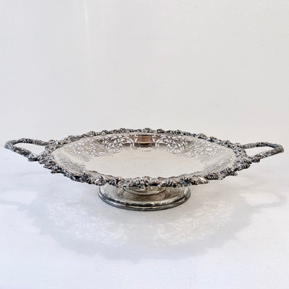 KLS Vaults 1960 sterling silver footed centerpiece bowl with intricate pierced lattice and grape vine repousse detail.