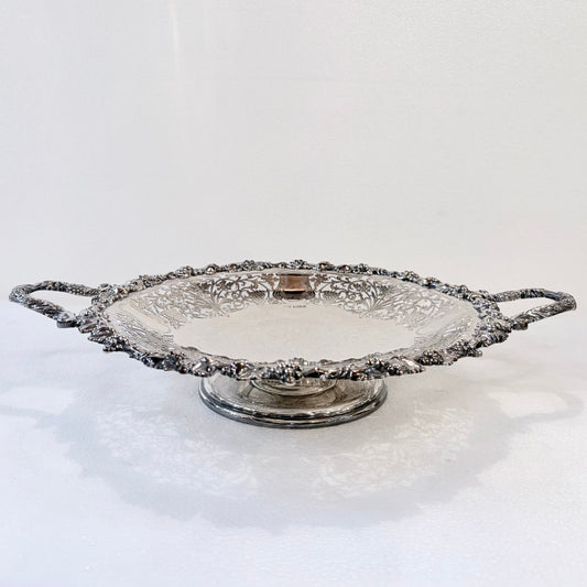 KLS Vaults 1960 sterling silver footed centerpiece bowl with intricate pierced lattice and grape vine repousse detail.