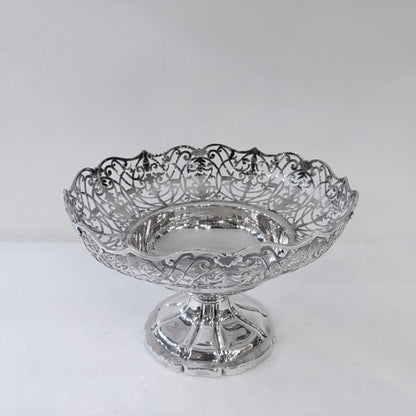 KLS Vaults 1935 sterling silver centerpiece bowl with intricate pierced scrollwork and a scalloped rim.