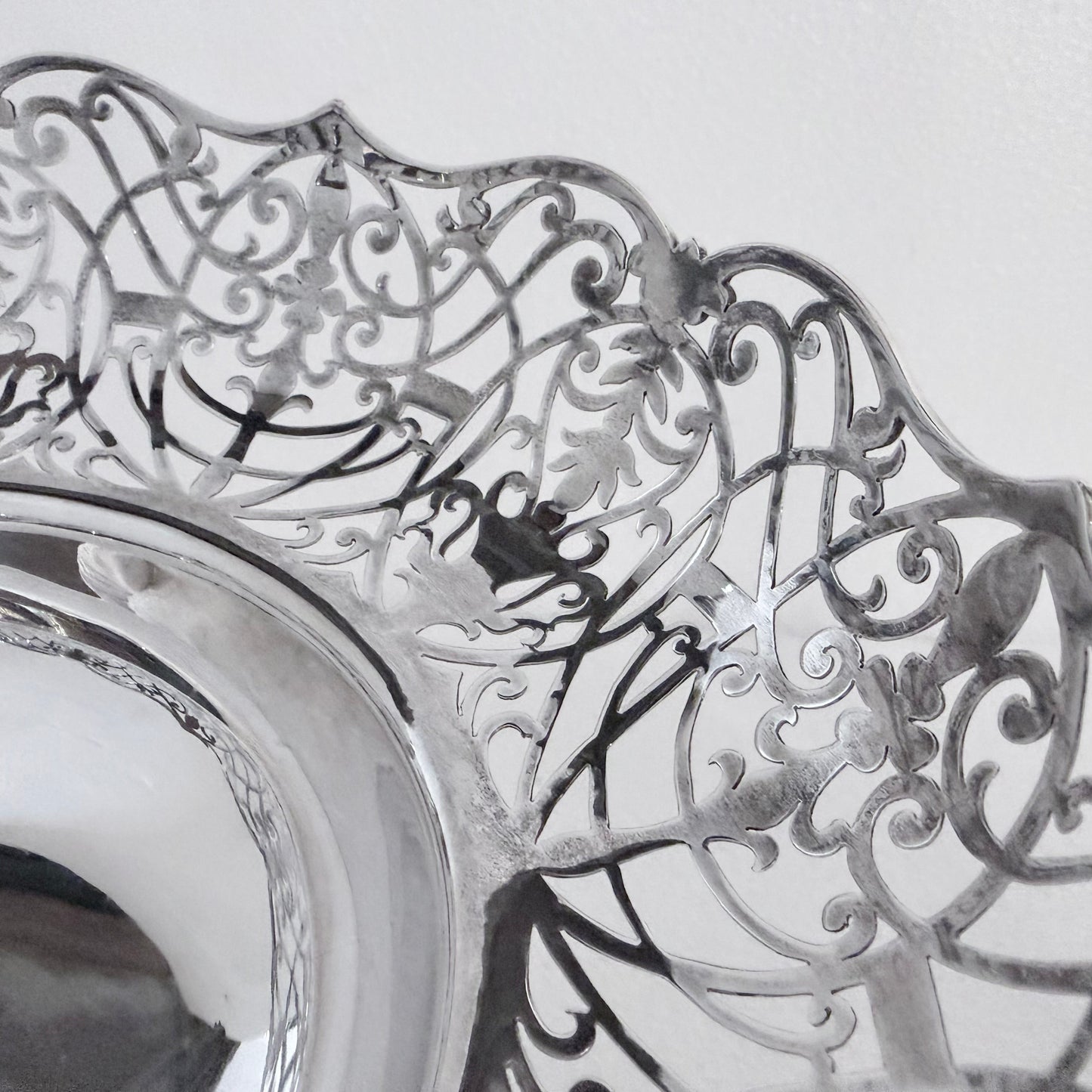 KLS Vaults 1935 sterling silver centerpiece with intricate pierced scrollwork and foliate filigree scalloped rim.