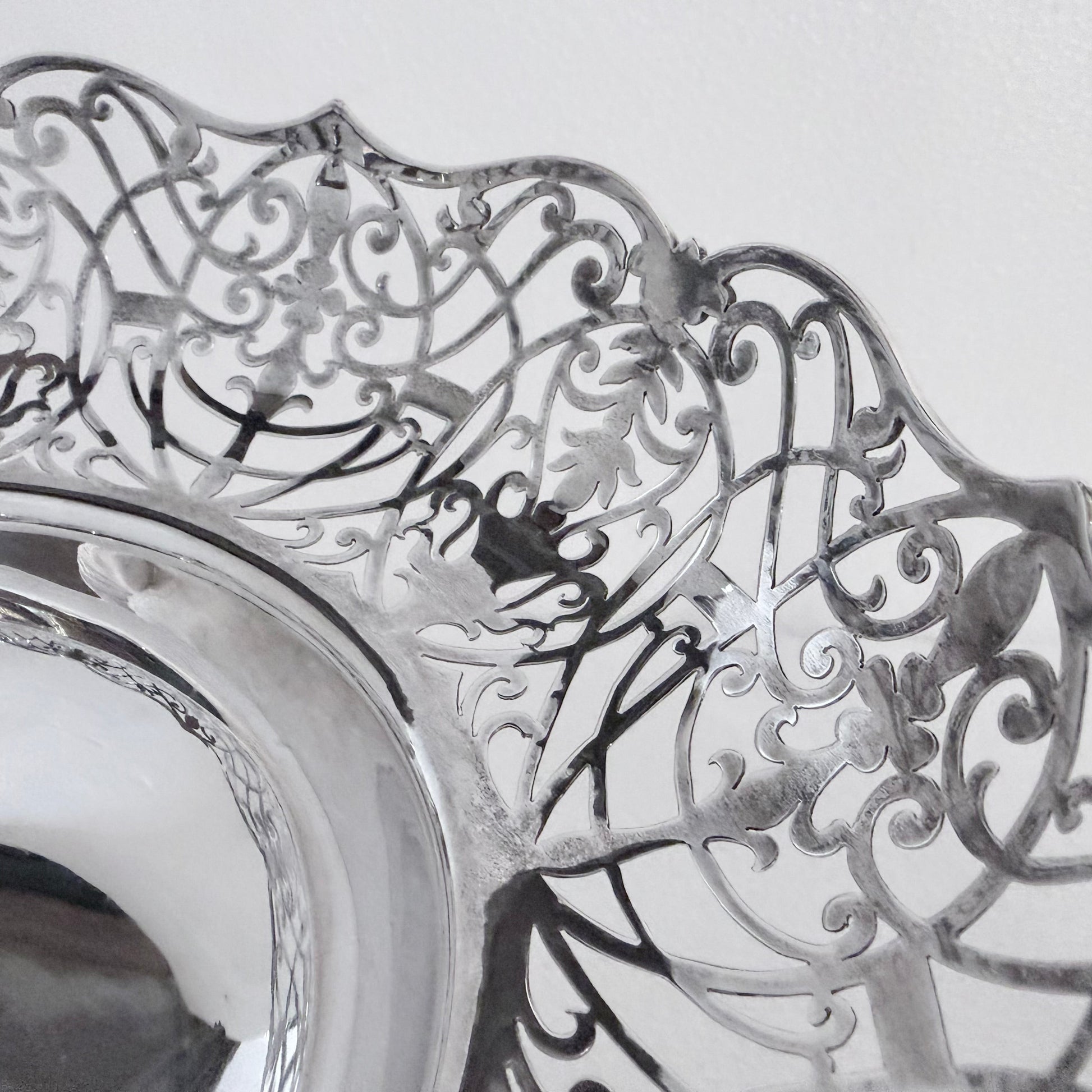 KLS Vaults 1935 sterling silver centerpiece with intricate pierced scrollwork and foliate filigree scalloped rim.
