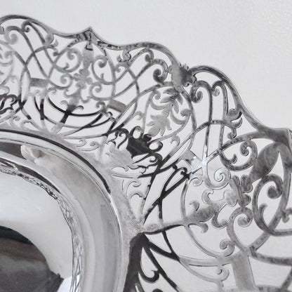 KLS Vaults 1935 sterling silver centerpiece with intricate pierced scrollwork and foliate filigree scalloped rim.