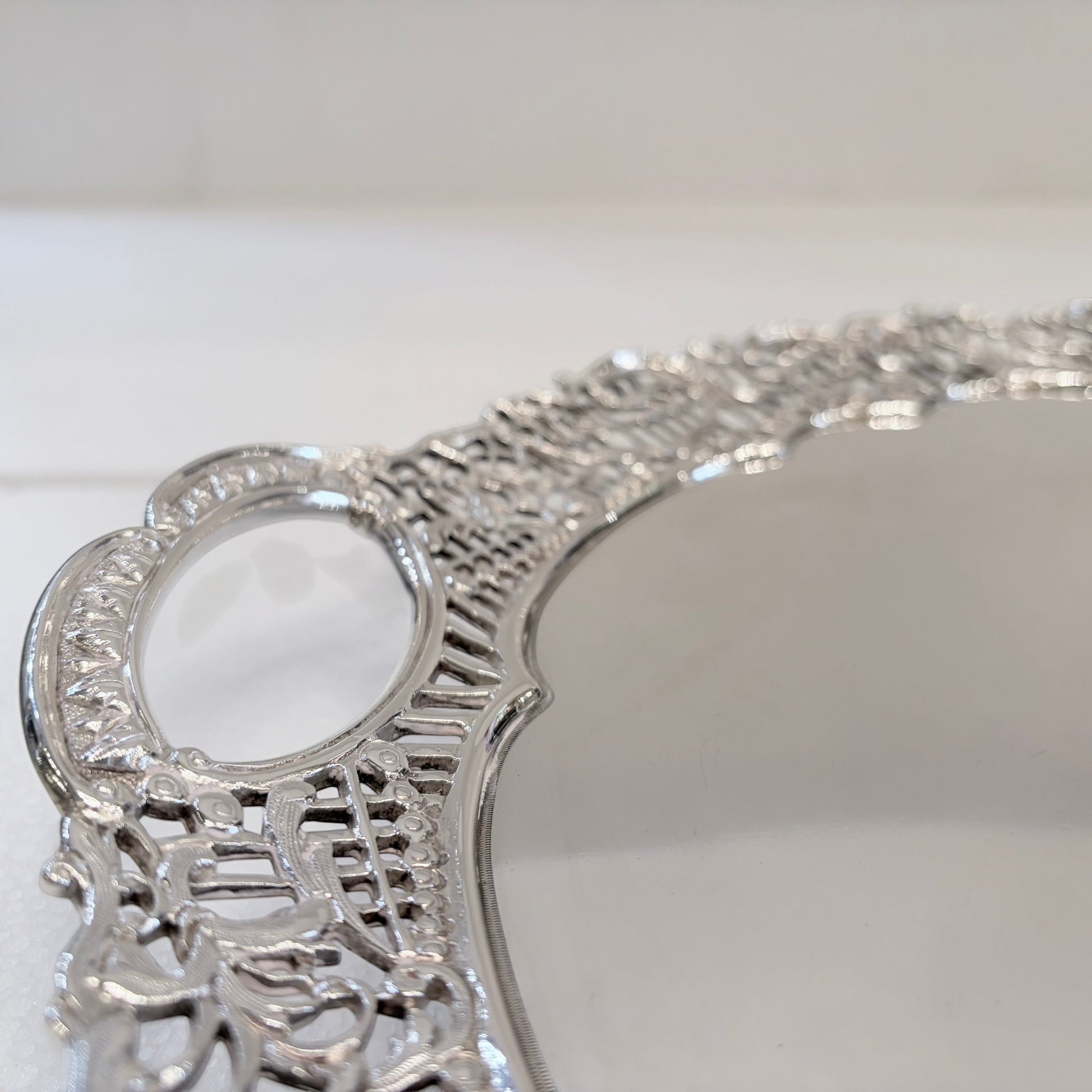 KLS Vaults Victorian sterling silver serving tray featuring intricate pierced floral border and integrated handle