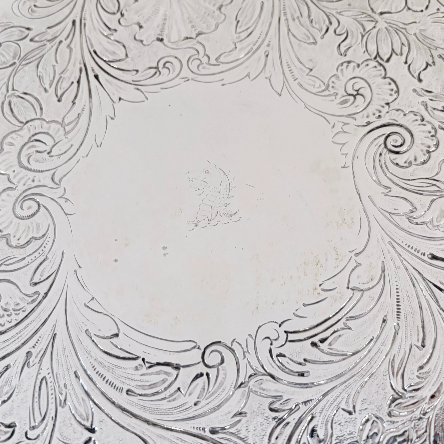 KLS Vaults 1835 William IV sterling silver salver with intricate chased foliate scrolls and central dragon crest