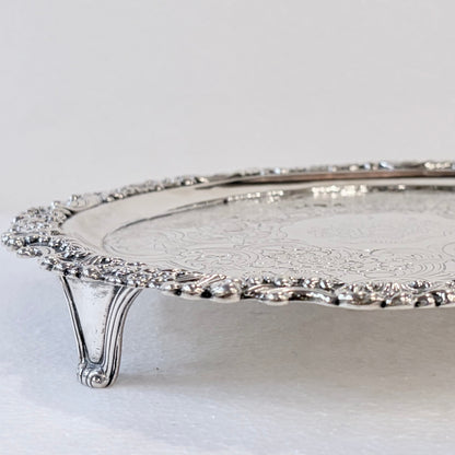 KLS Vaults 1831 William IV sterling silver salver with ornate acanthus leaf border and intricate flat-chased detail.