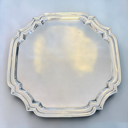 KLS Vaults 1937 sterling silver square salver with a Chippendale border and polished finish.